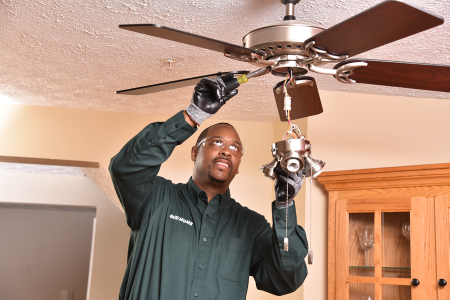 BGE HOME electrician repairing a ceiling fan