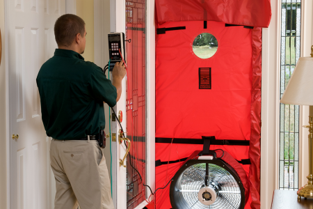 BGE HOME certified energy auditor measuring a home's energy efficiency